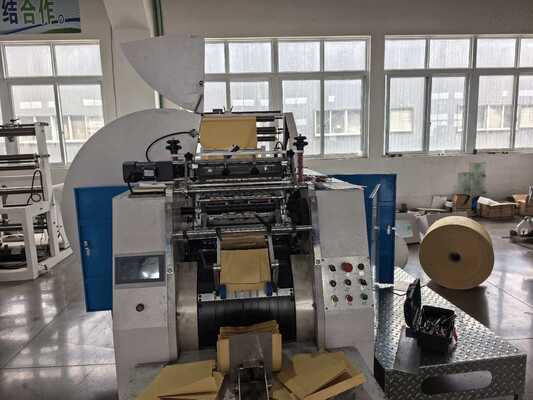 Машина для герметизации и резки пакетов Kraft Paper Bag Making Machine с шириной пакета от 420 до 600 мм и 400 сетчатым керамическим печатным роликом